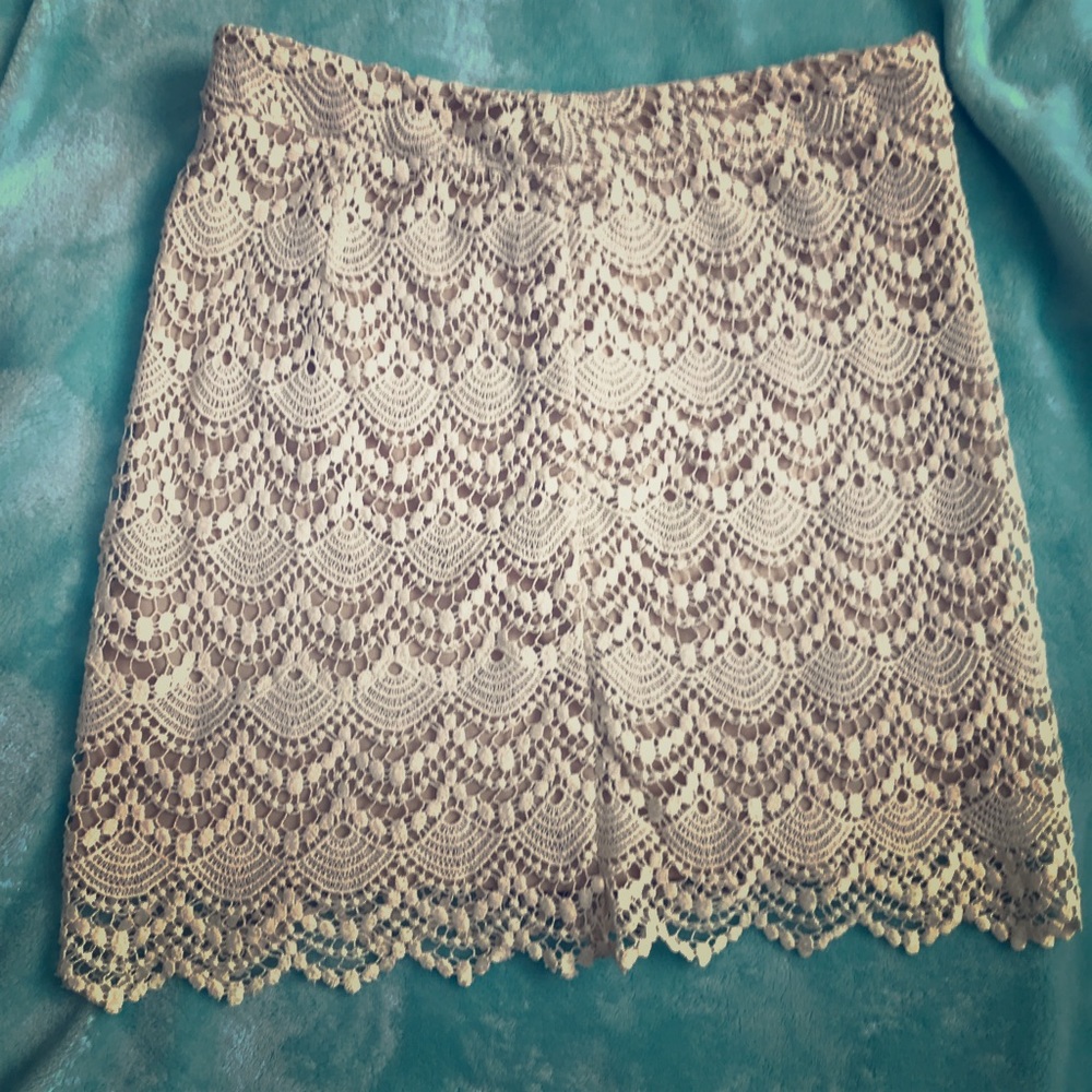 Crochet mini skirt.